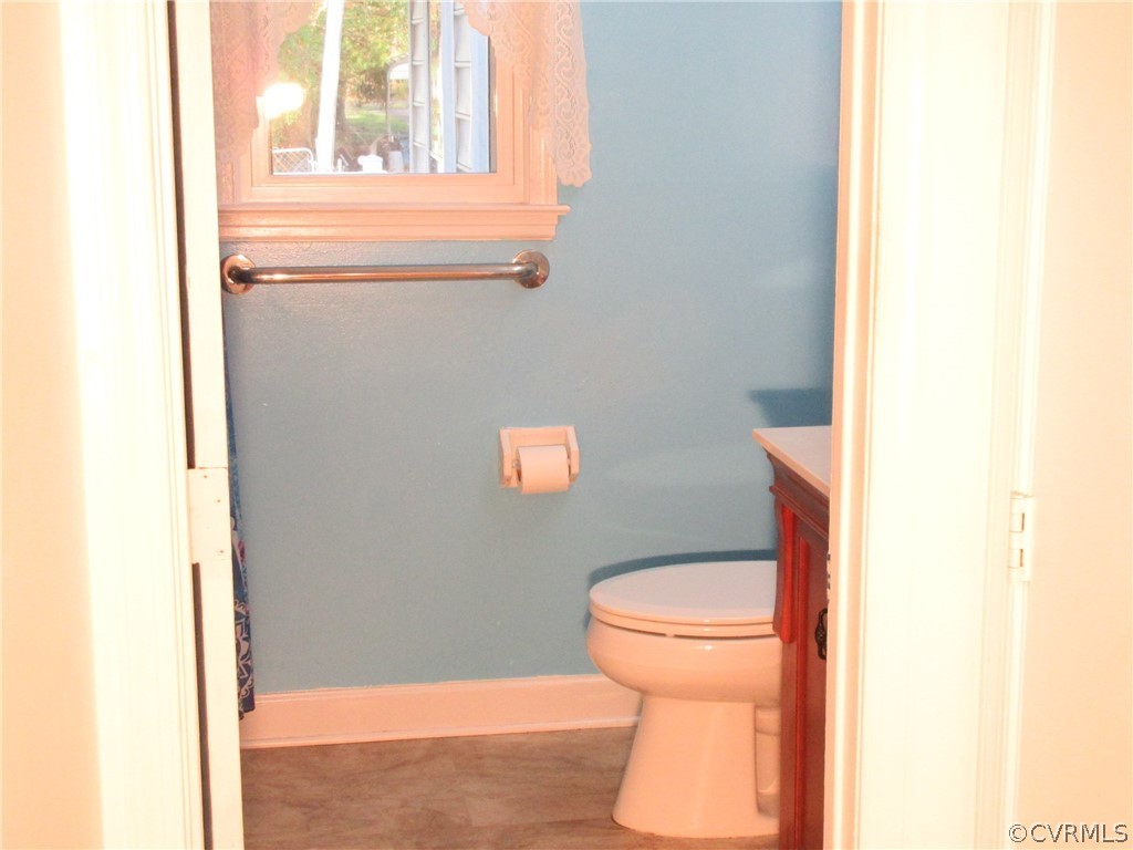 15413 Saddlebrook Road Chesterfield, VA 23838 - Photo 21 of 39 a bathroom with a toilet and a sink