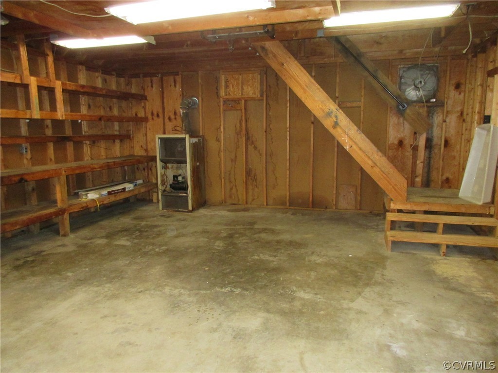 15413 Saddlebrook Road Chesterfield, VA 23838 - Photo 35 of 39 a view of an empty room with wooden shelves