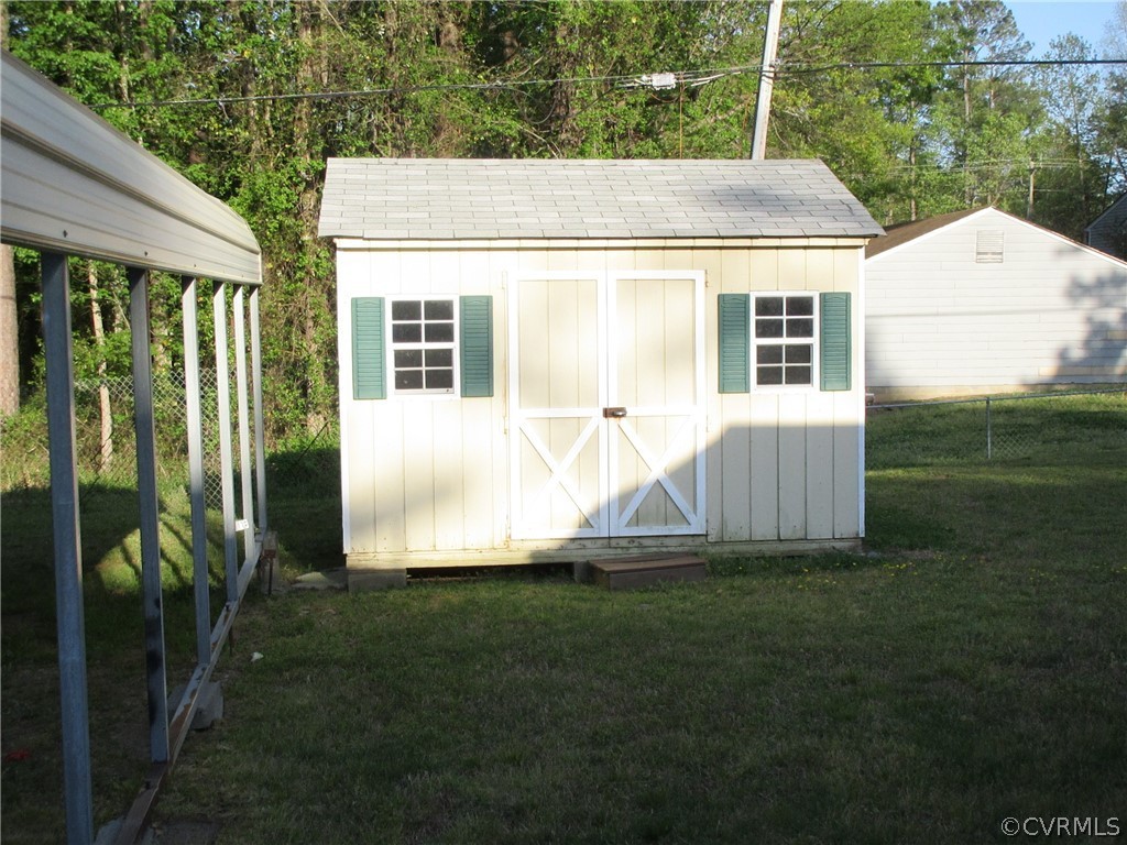 15413 Saddlebrook Road Chesterfield, VA 23838 - Photo 4 of 39 a view of backyard with barbeque grill and potted plants