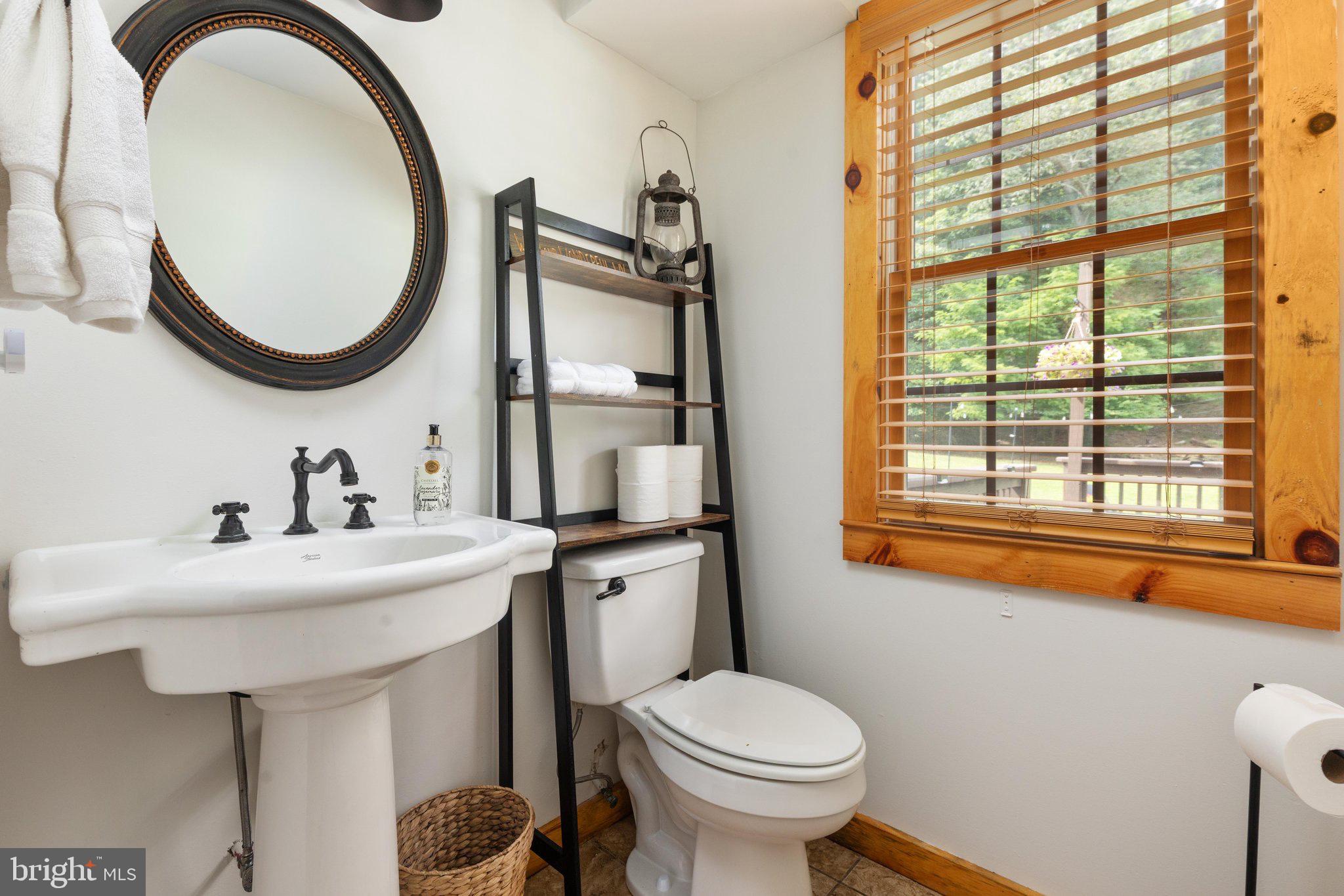 1396 Cullers Run Road Mathias, WV 26812 - Photo 17 of 79 Charming bathroom with rustic accents.