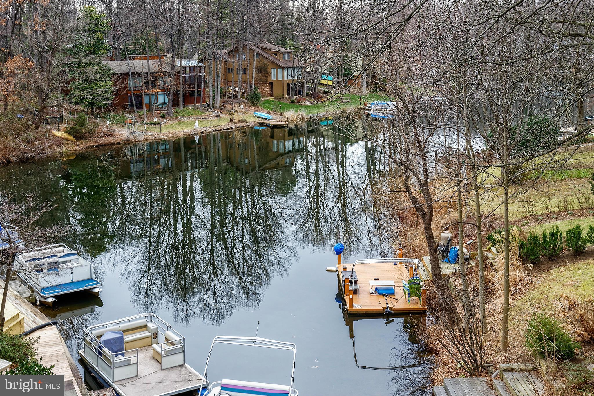 2022 Turtle Pond Drive Reston, VA 20191 - Photo 2 of 30 a view of multiple houses with outdoor seating