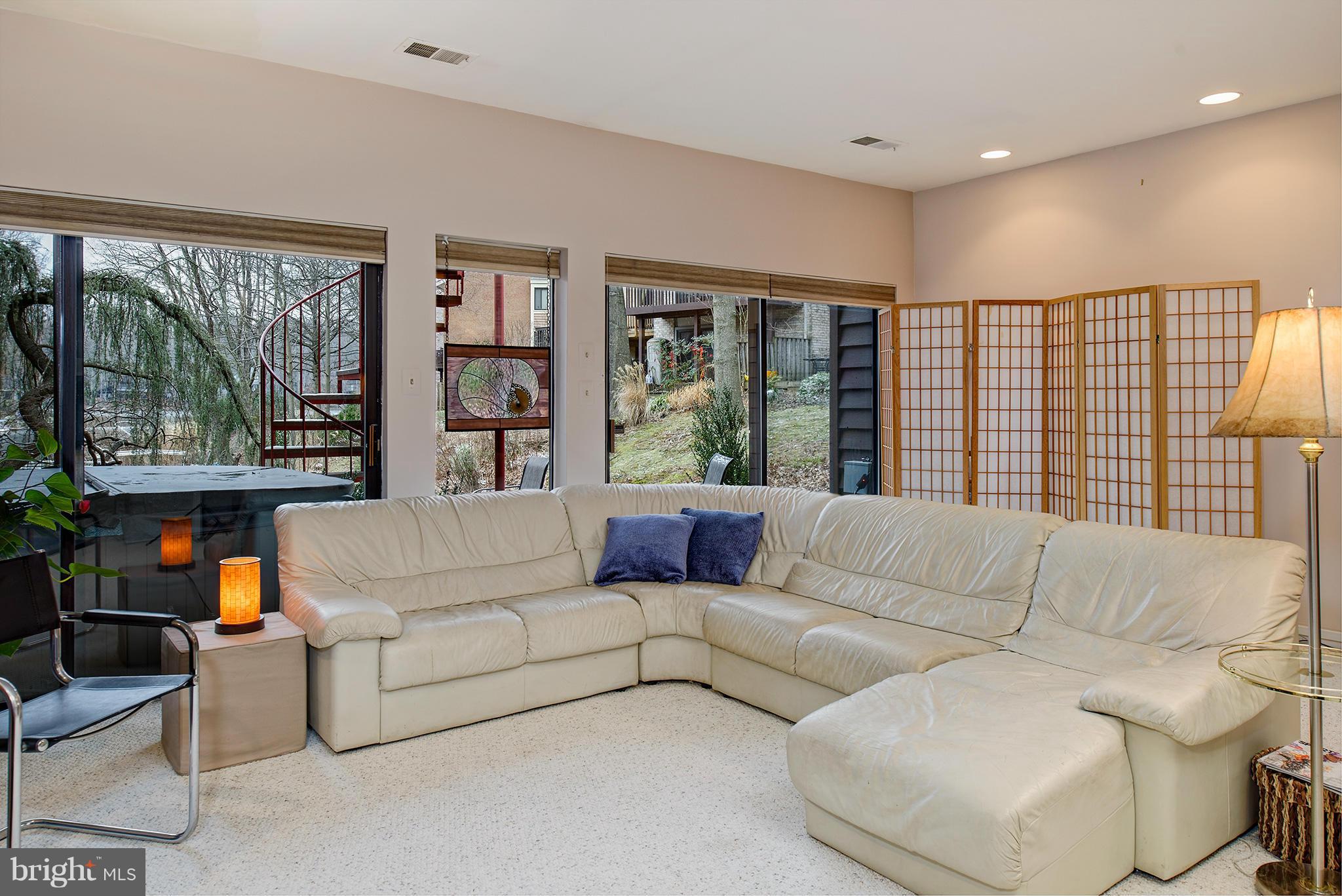 2022 Turtle Pond Drive Reston, VA 20191 - Photo 25 of 30 a living room with furniture and a large window