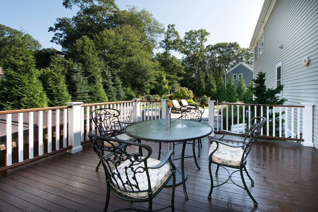 17 Evangeline Drive Scituate, MA 02066 - Photo 11 of 27 a view of a chairs and table on the deck
