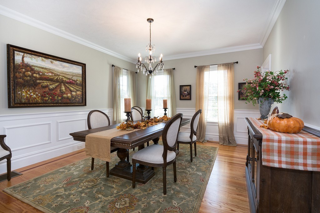 17 Evangeline Drive Scituate, MA 02066 - Photo 12 of 27 a view of a dining room with furniture and chandelier