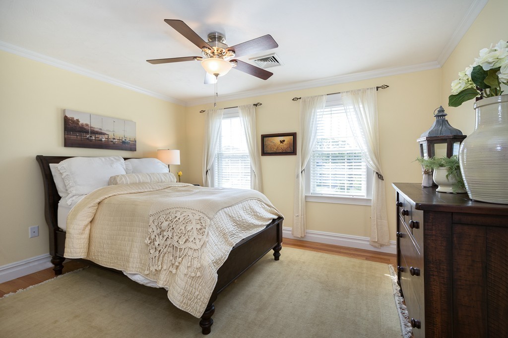 17 Evangeline Drive Scituate, MA 02066 - Photo 19 of 27 a spacious bedroom with a bed and a window