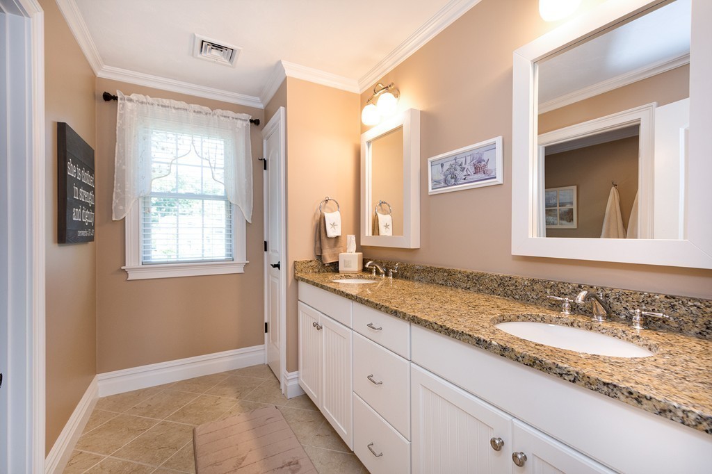 17 Evangeline Drive Scituate, MA 02066 - Photo 20 of 27 a bathroom with a granite countertop sink mirror and double