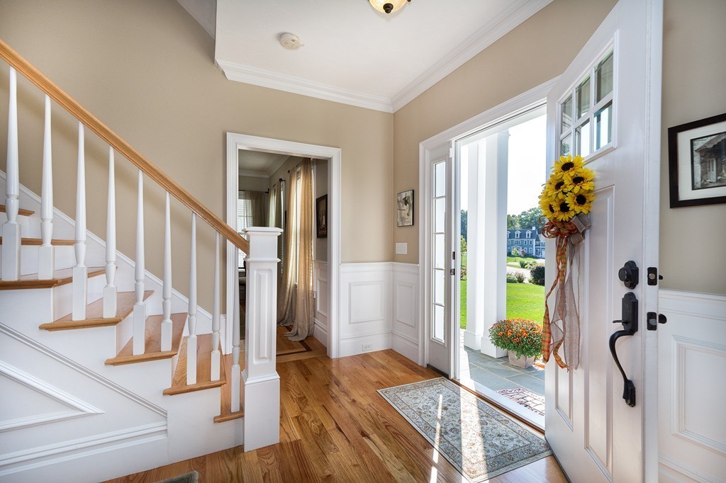 17 Evangeline Drive Scituate, MA 02066 - Photo 4 of 27 a view of an entryway with wooden floor and a livingroom view
