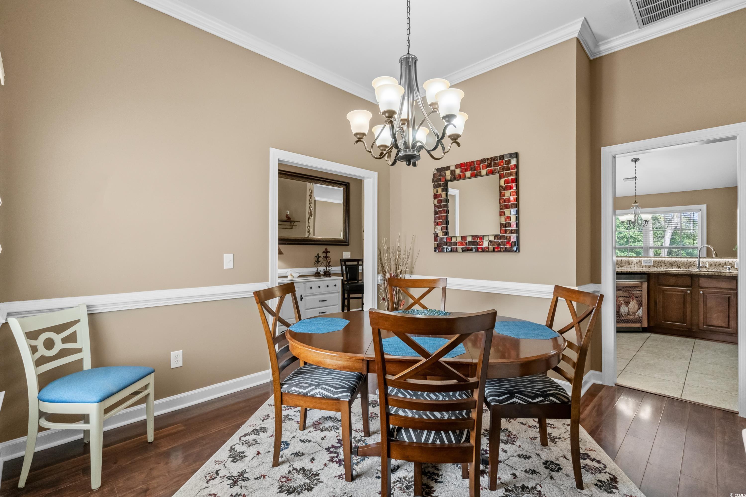 139 Dunbarton Lane Conway, SC 29526 - Photo 13 of 40 Dining area featuring wood finished floors, basebo