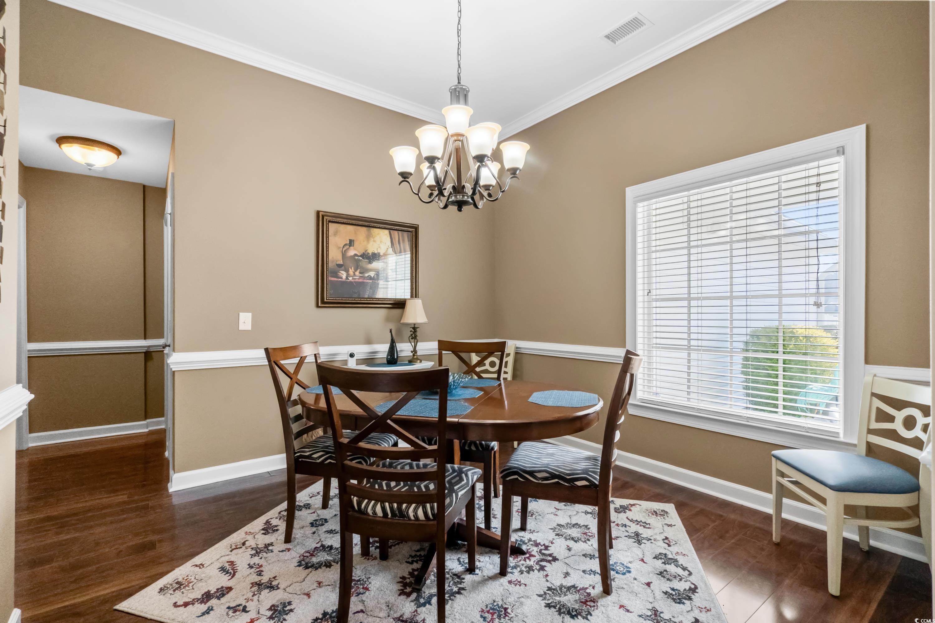 139 Dunbarton Lane Conway, SC 29526 - Photo 14 of 40 Dining area with visible vents, dark wood-type flo