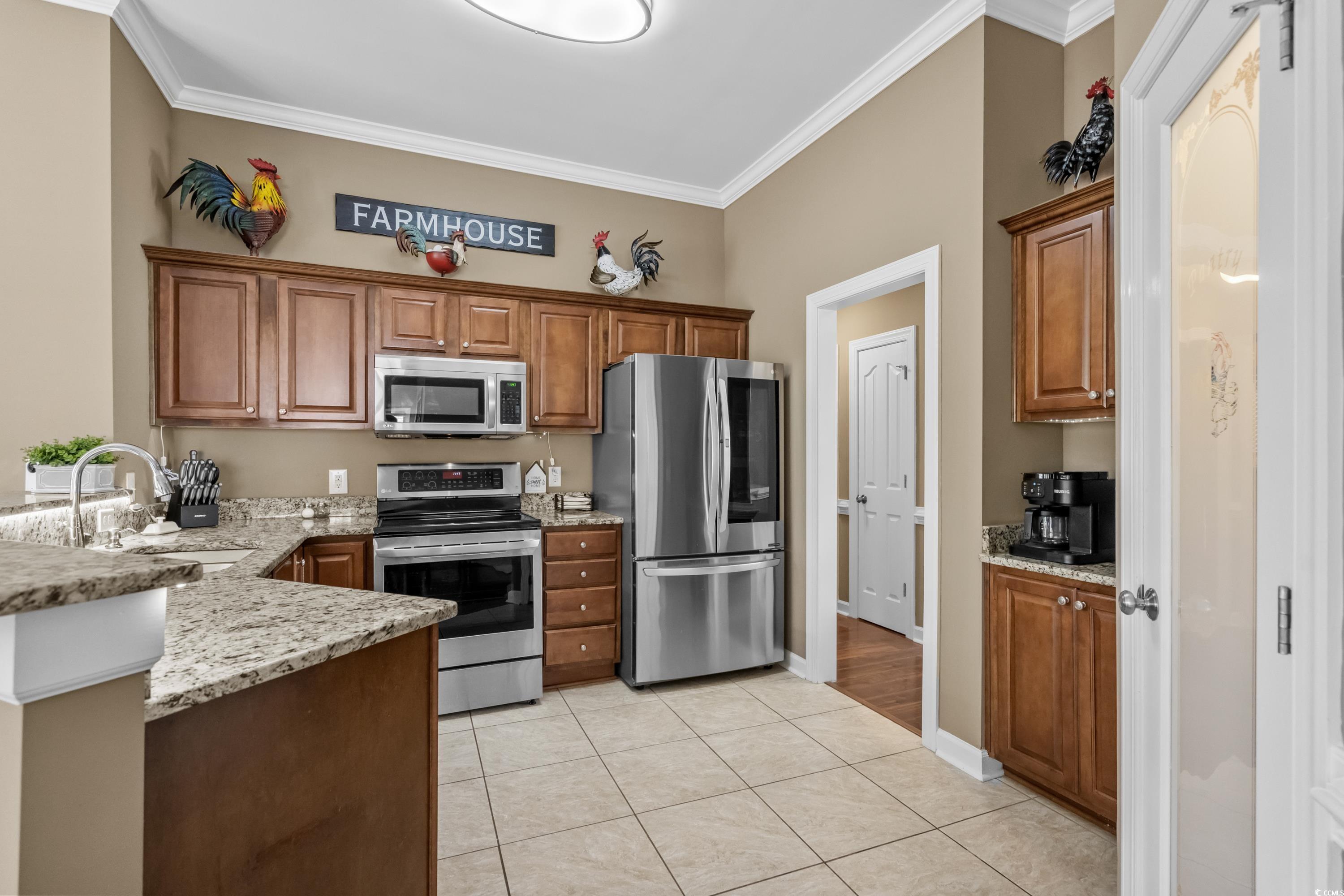 139 Dunbarton Lane Conway, SC 29526 - Photo 17 of 40 Kitchen featuring ornamental molding, light stone