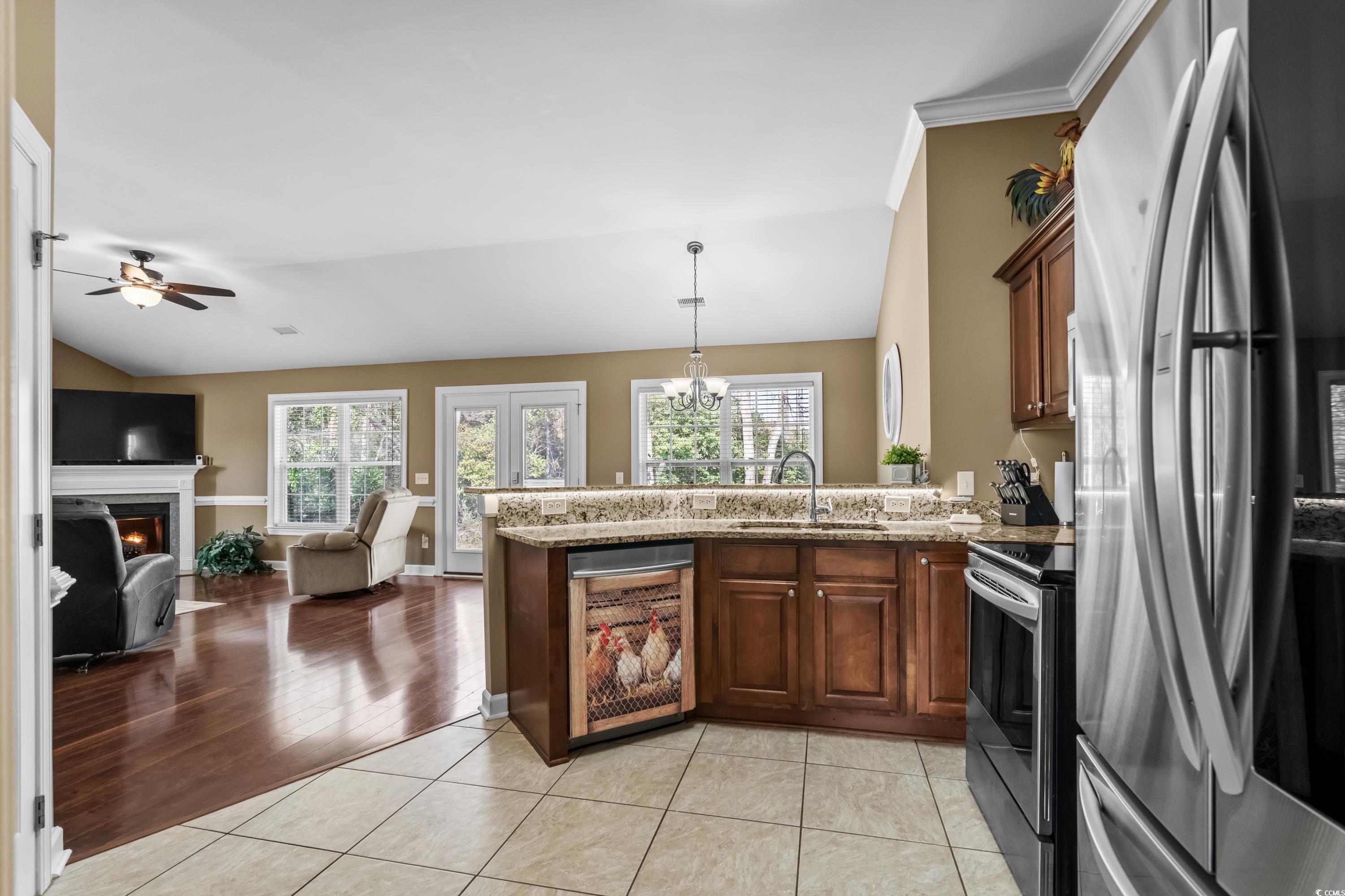 139 Dunbarton Lane Conway, SC 29526 - Photo 18 of 40 Kitchen with ceiling fan with notable chandelier,