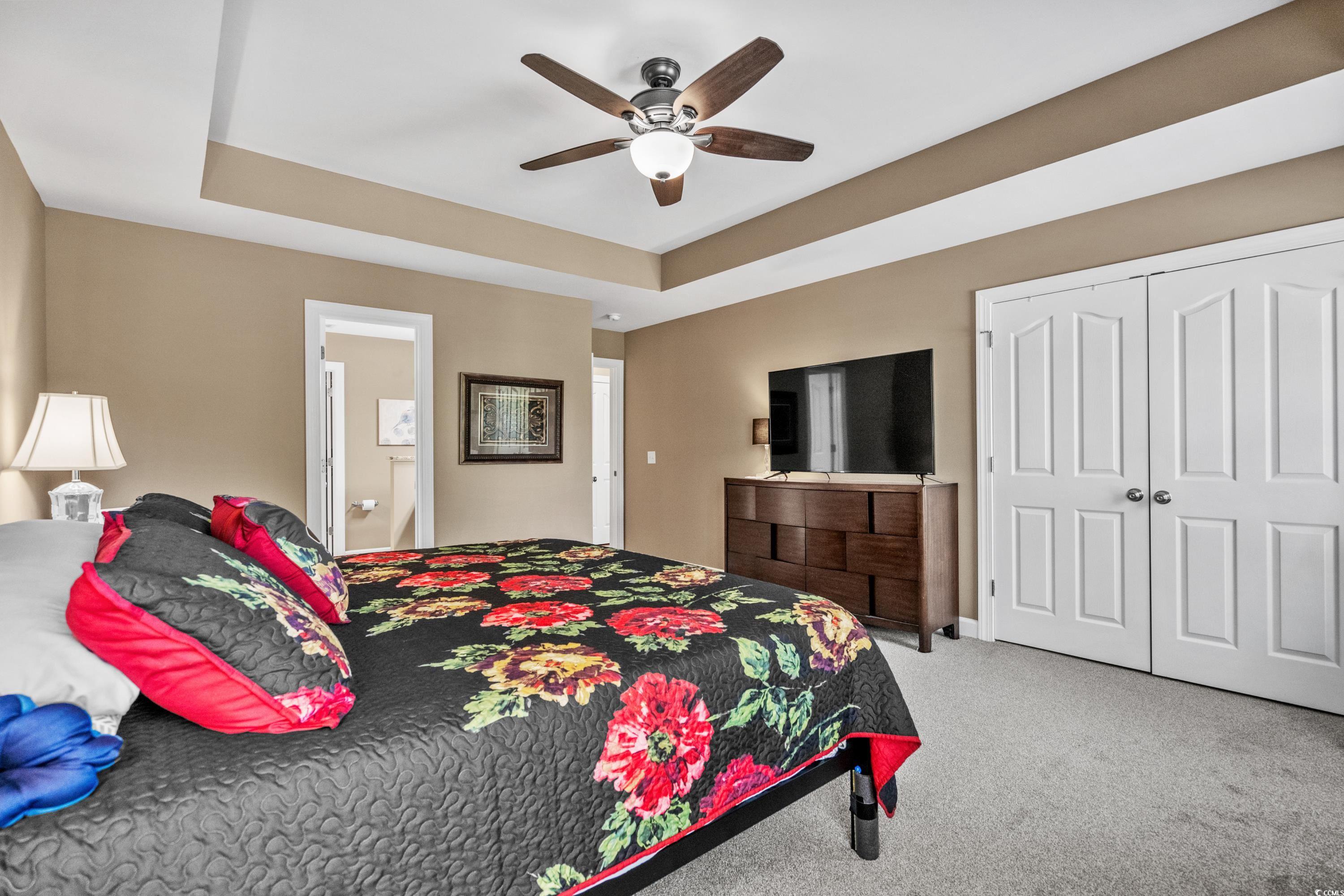 139 Dunbarton Lane Conway, SC 29526 - Photo 25 of 40 Carpeted bedroom featuring a tray ceiling, a close