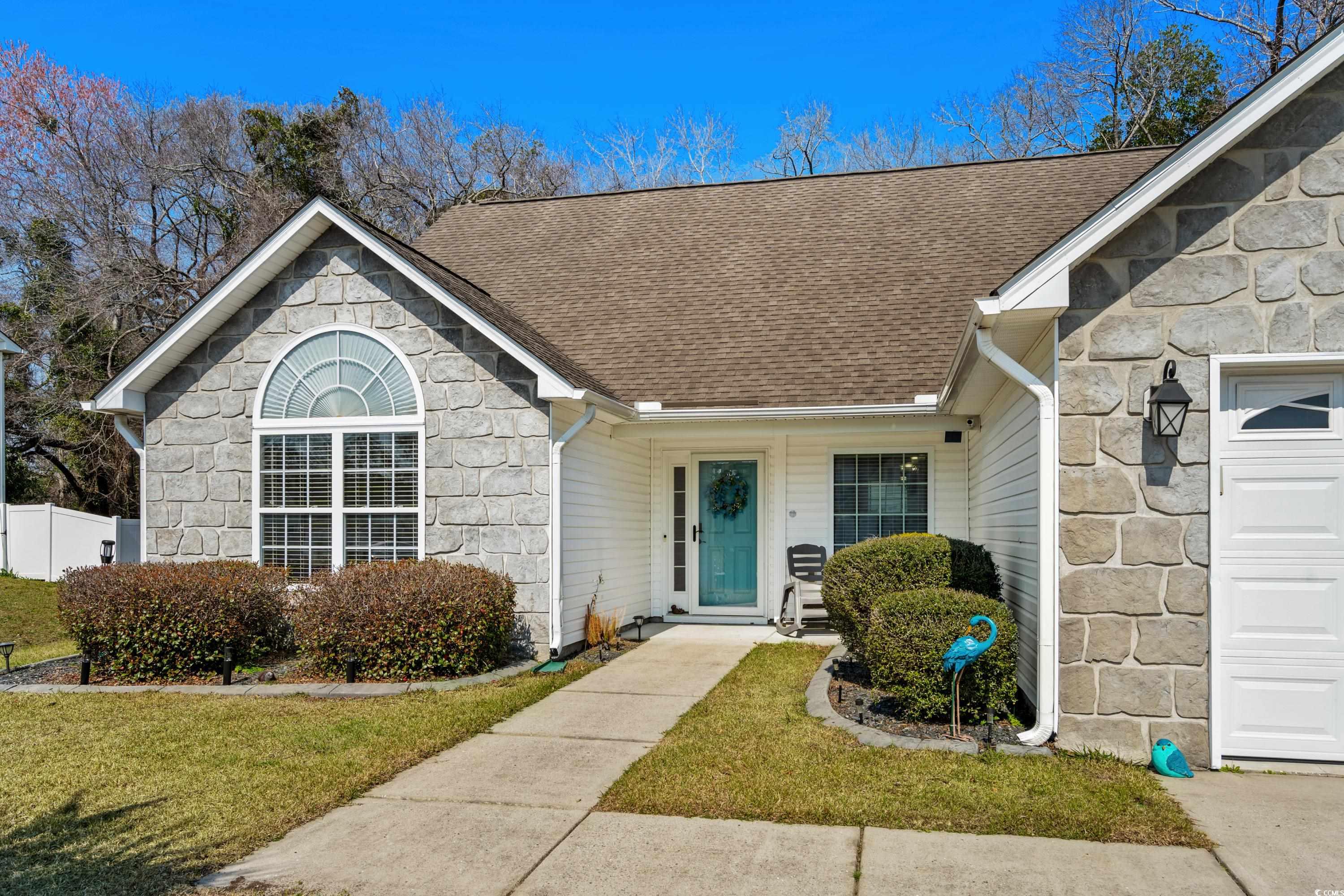 139 Dunbarton Lane Conway, SC 29526 - Photo 3 of 40 Entrance to property featuring a garage, stone sid