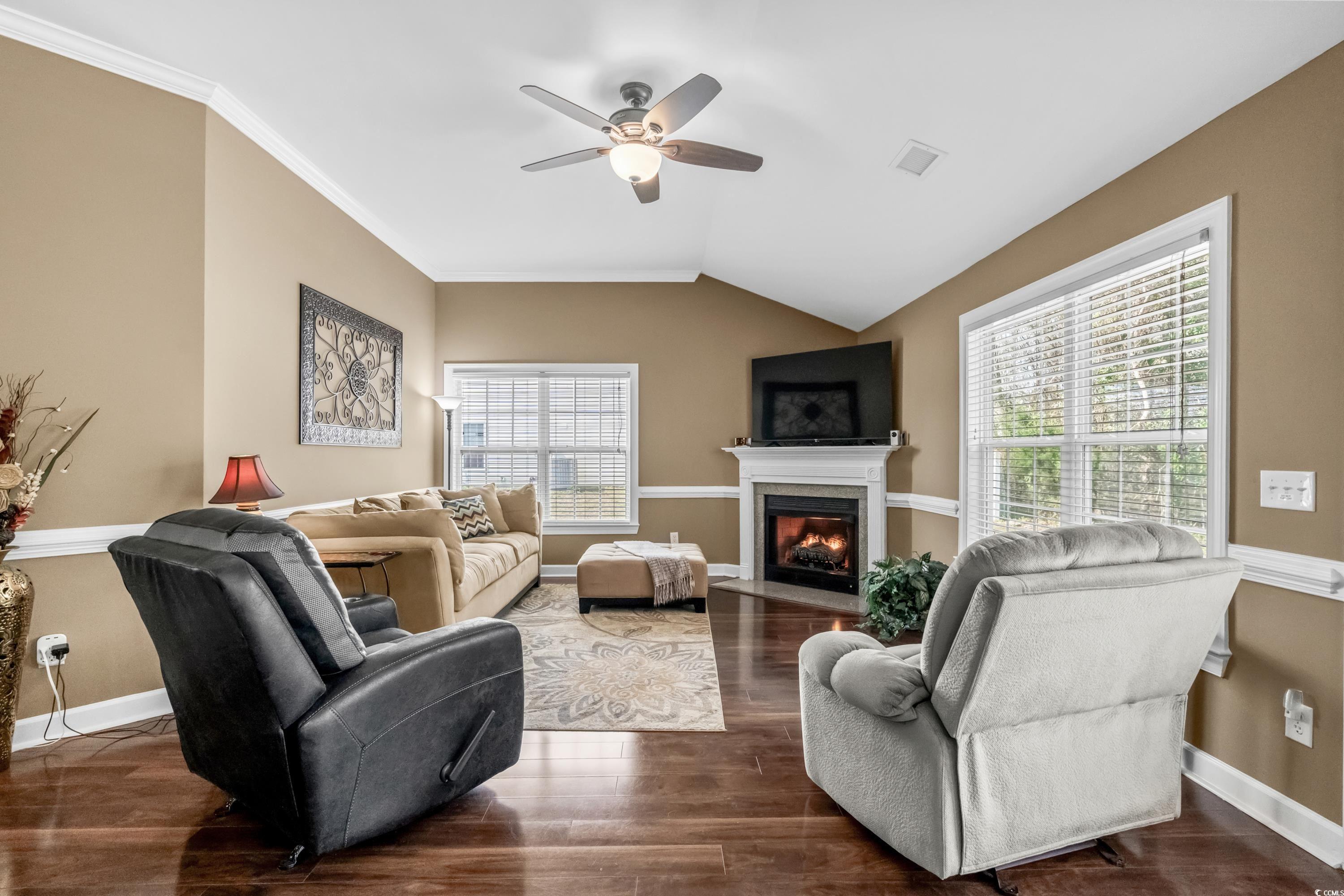 139 Dunbarton Lane Conway, SC 29526 - Photo 7 of 40 Living room featuring baseboards, lofted ceiling,