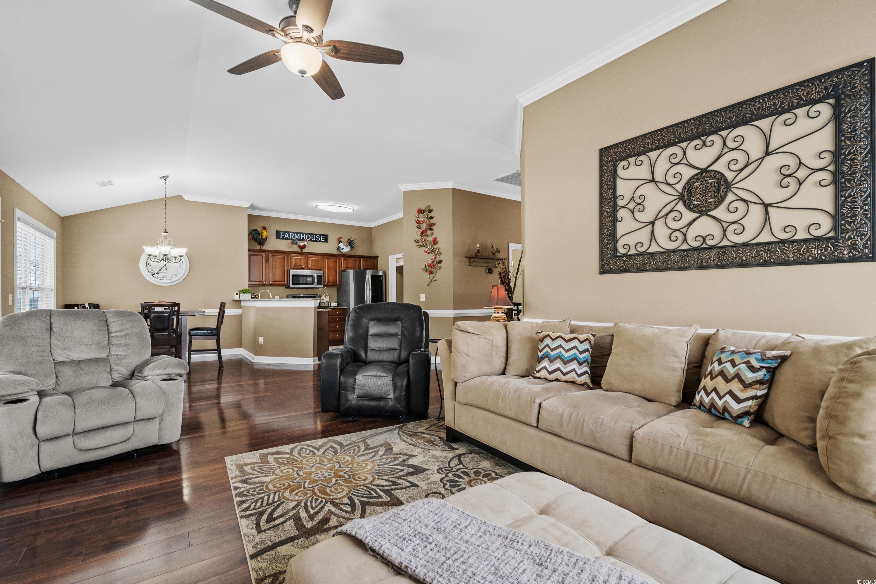 139 Dunbarton Lane Conway, SC 29526 - Photo 10 of 40 Living area featuring lofted ceiling, dark wood fi