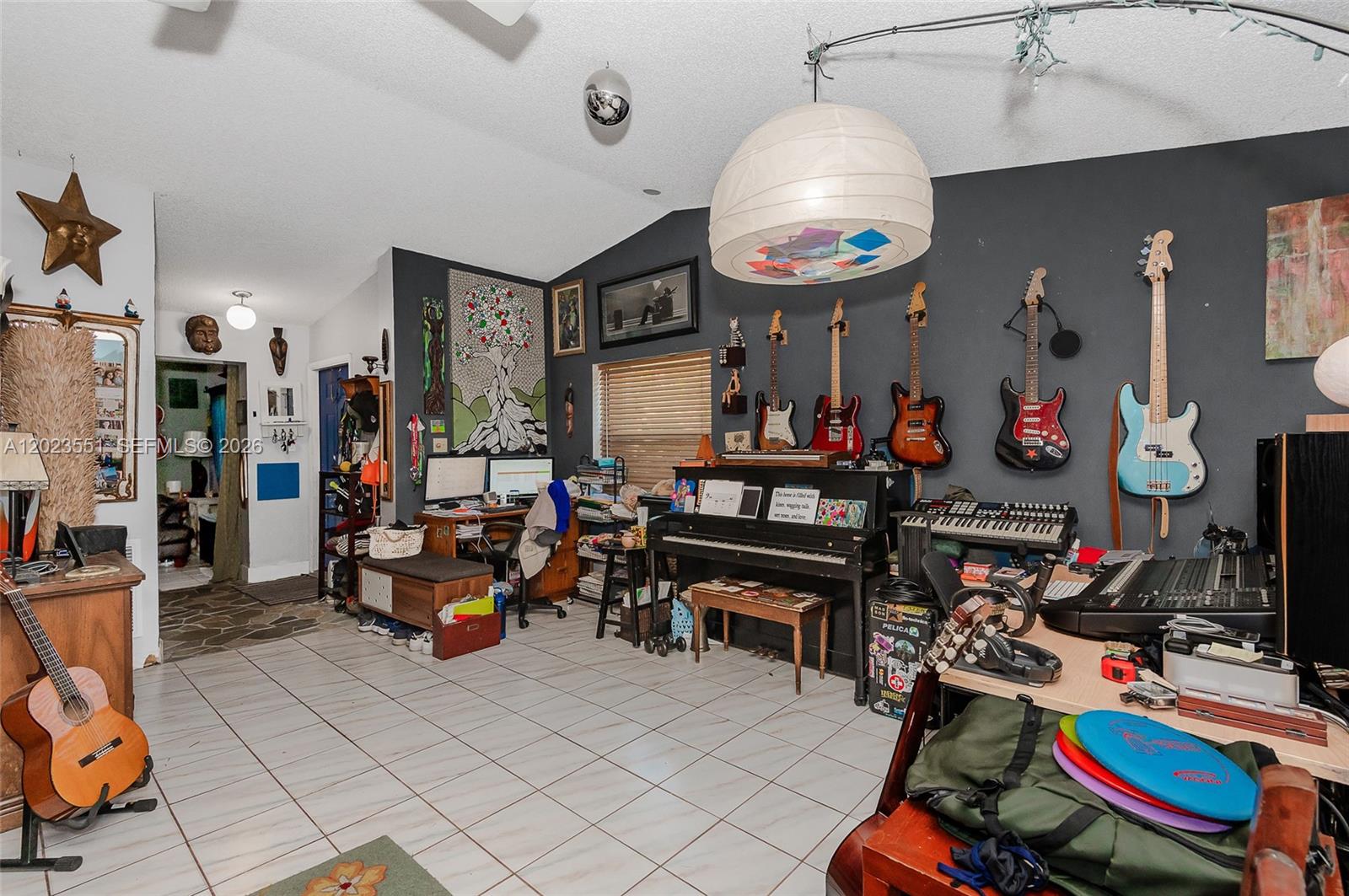 11482 Southwest 109th Road, Unit 29A Miami, FL 33176 - Photo 6 of 28 a view of a room with gym equipment