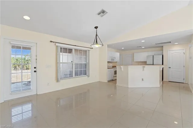 a view of a kitchen with a sink