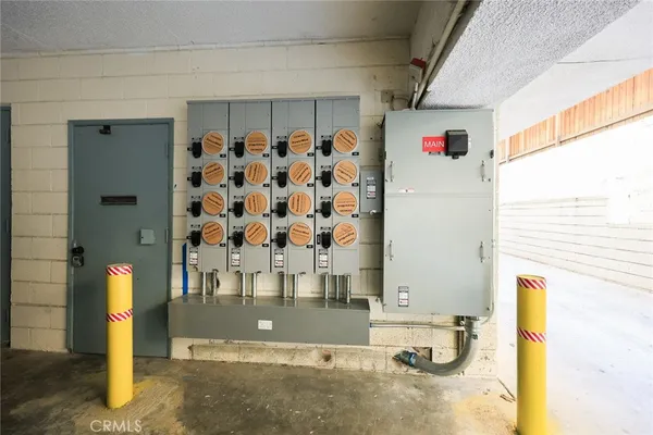 a stove top oven sitting inside of a kitchen