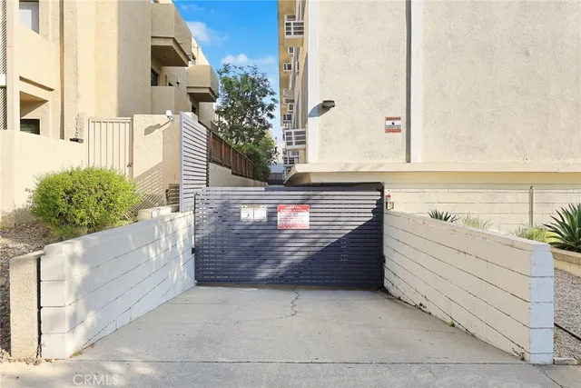 a view of a bedroom with stairs and a stairs