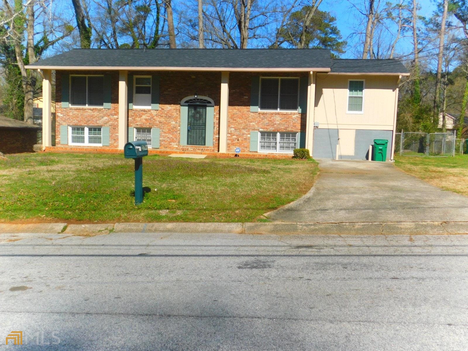 2396 Tiffany Place Decatur, GA 30035 - Photo 1 of 1 front view of a house with a yard