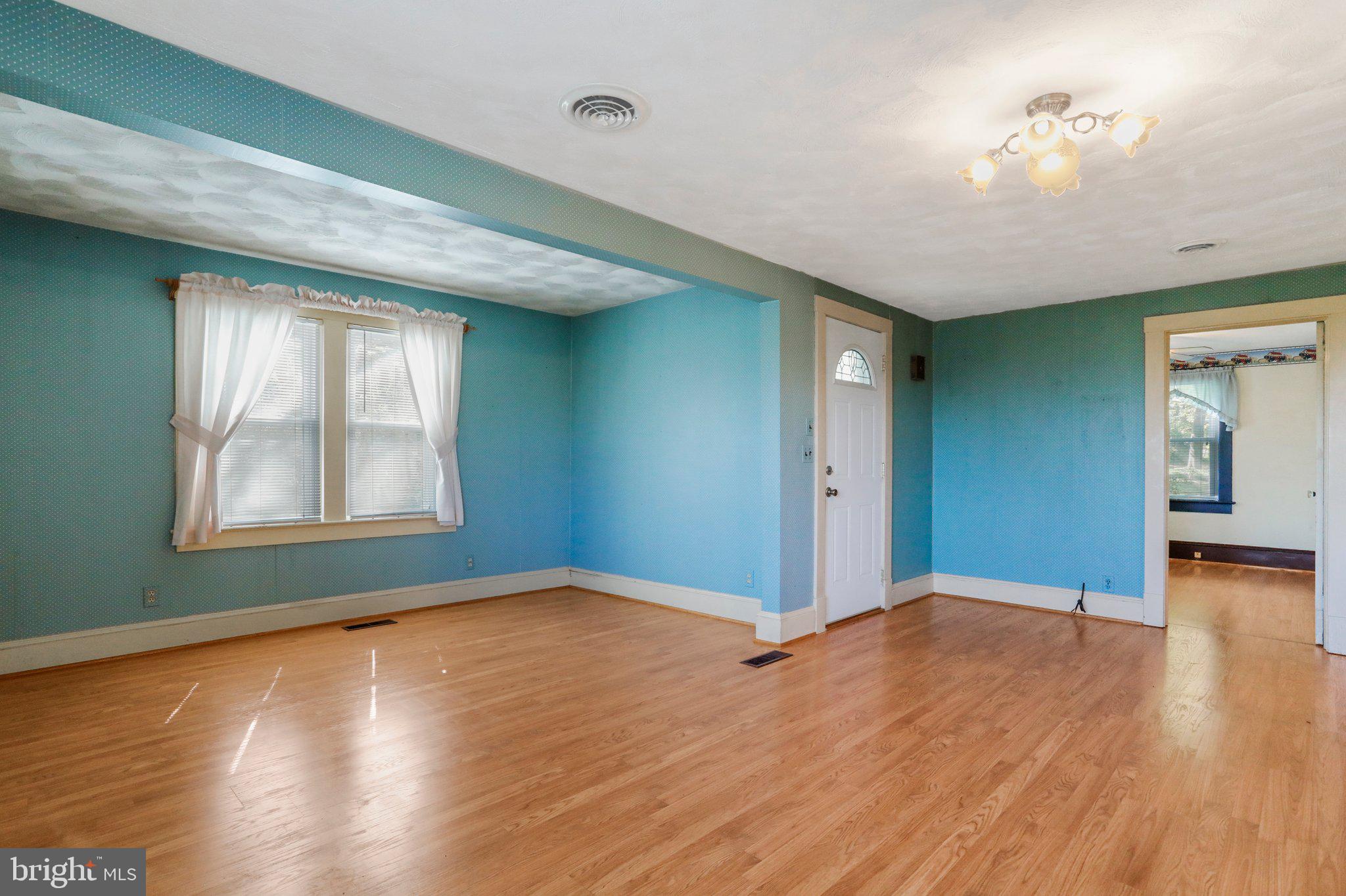 1477 Clearview Road Luray, VA 22835 - Photo 13 of 39 a view of livingroom with window and hardwood floor