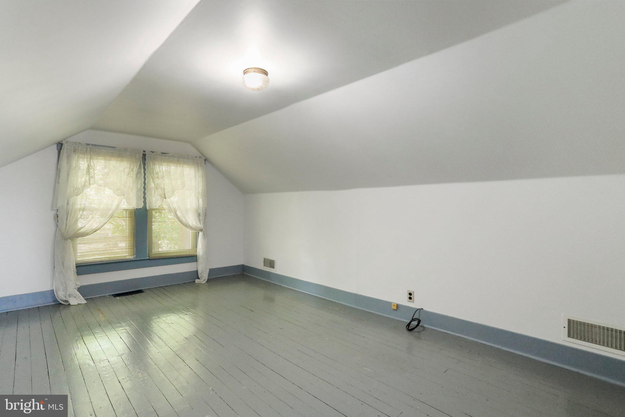 1477 Clearview Road Luray, VA 22835 - Photo 24 of 39 an empty room with wooden floor and windows