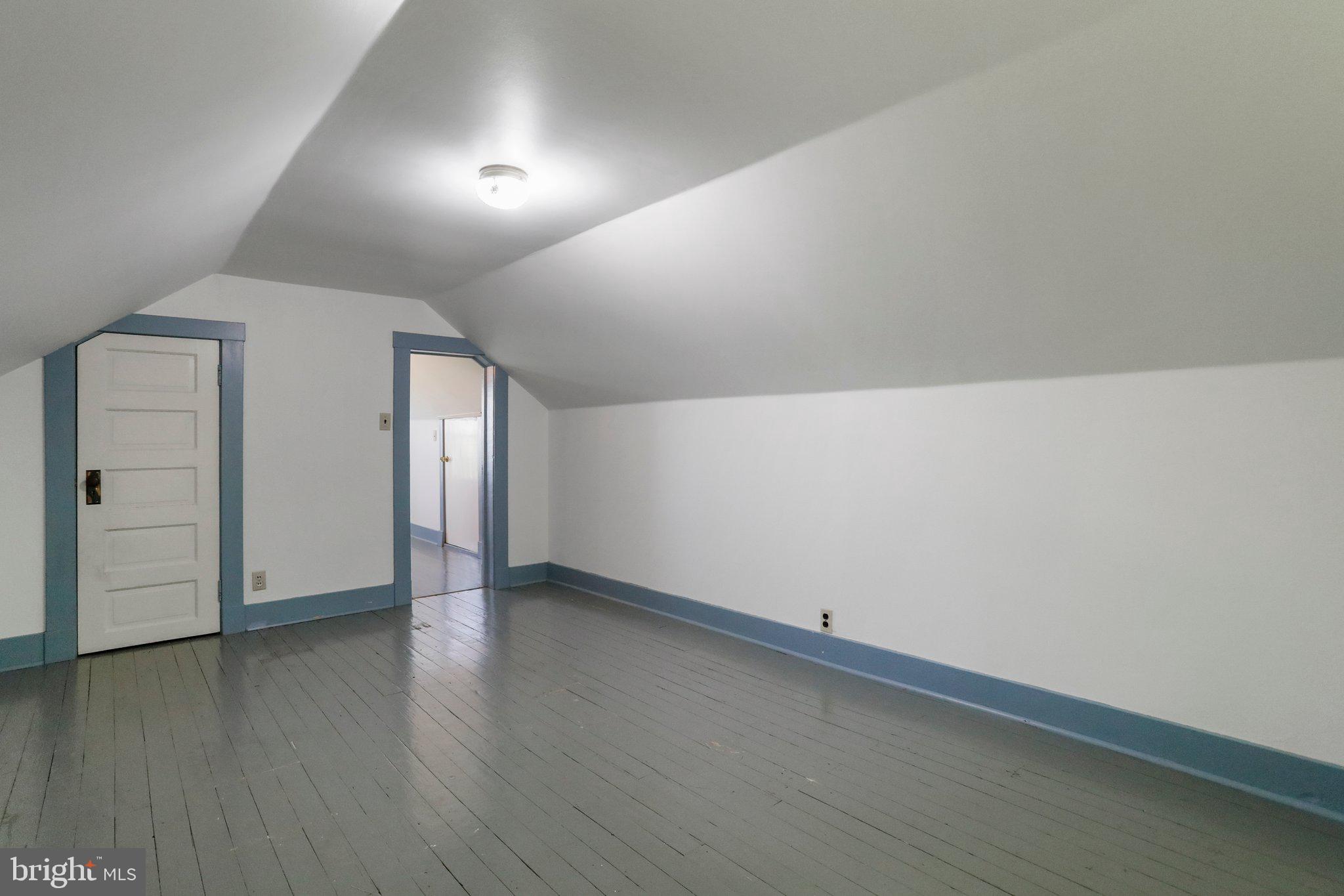 1477 Clearview Road Luray, VA 22835 - Photo 26 of 39 an empty room with wooden floor and windows