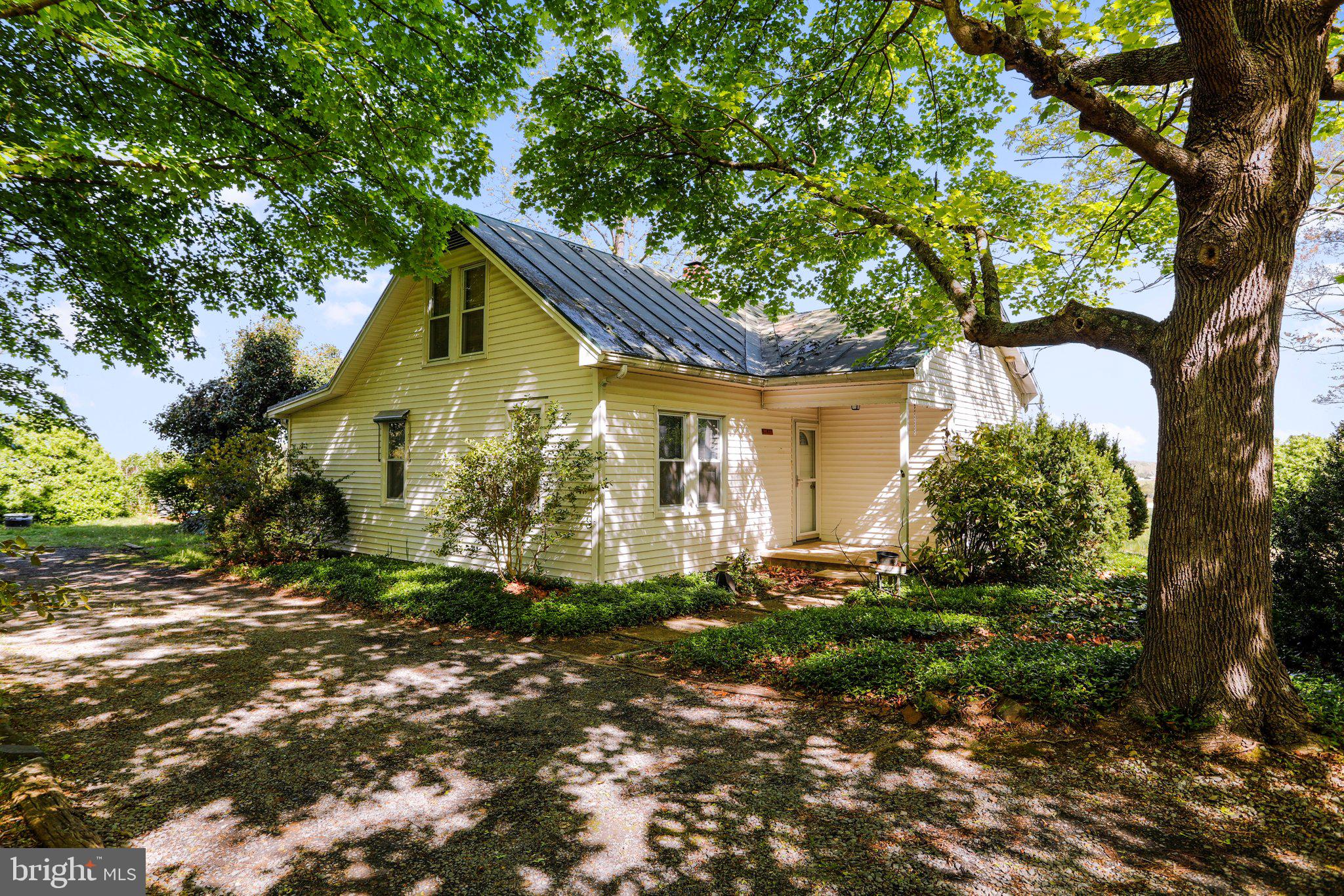 1477 Clearview Road Luray, VA 22835 - Photo 36 of 39 a view of a house with a tree in the yard