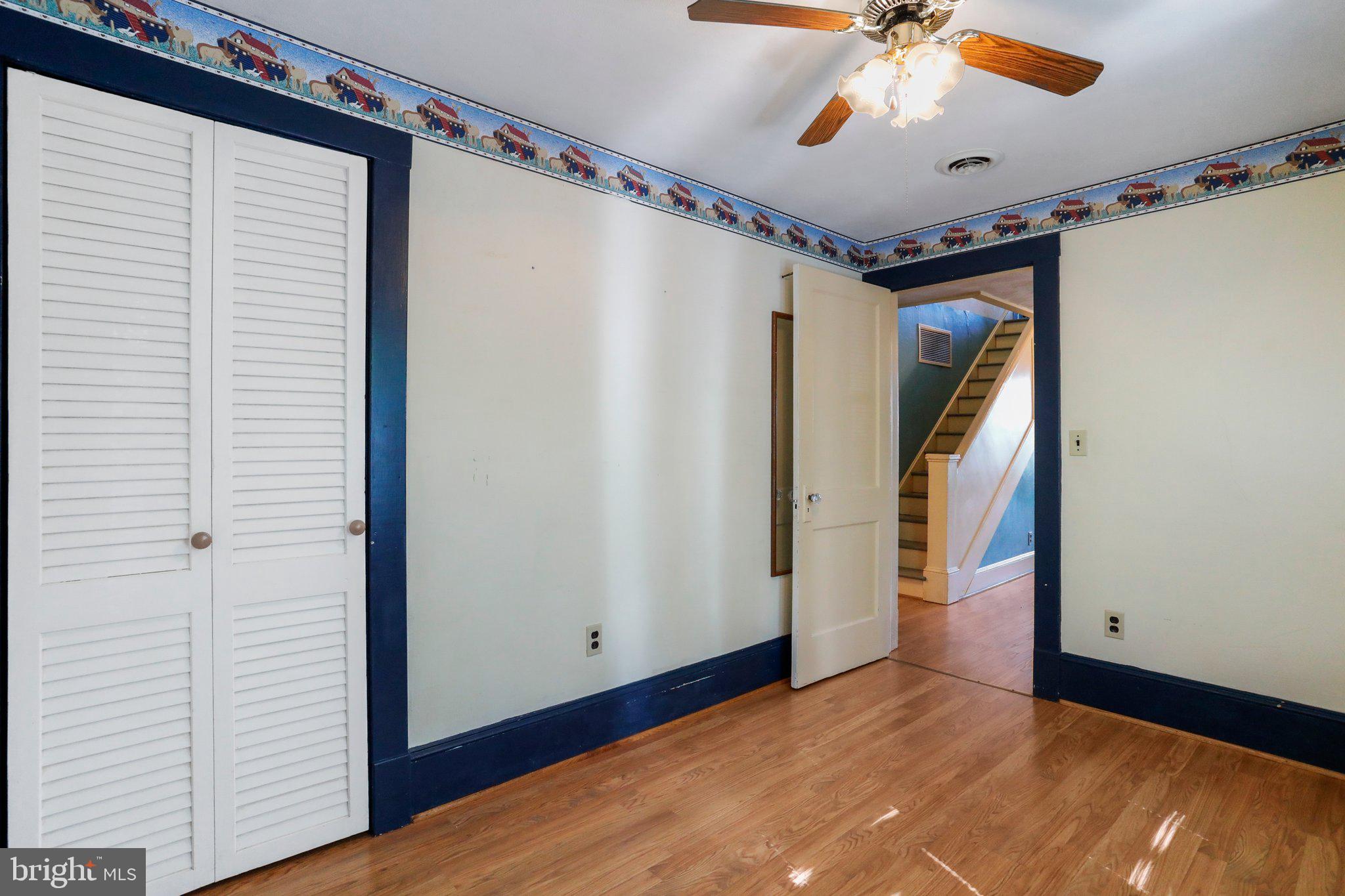 1477 Clearview Road Luray, VA 22835 - Photo 5 of 39 a view of a hallway with closet and a chandelier fan