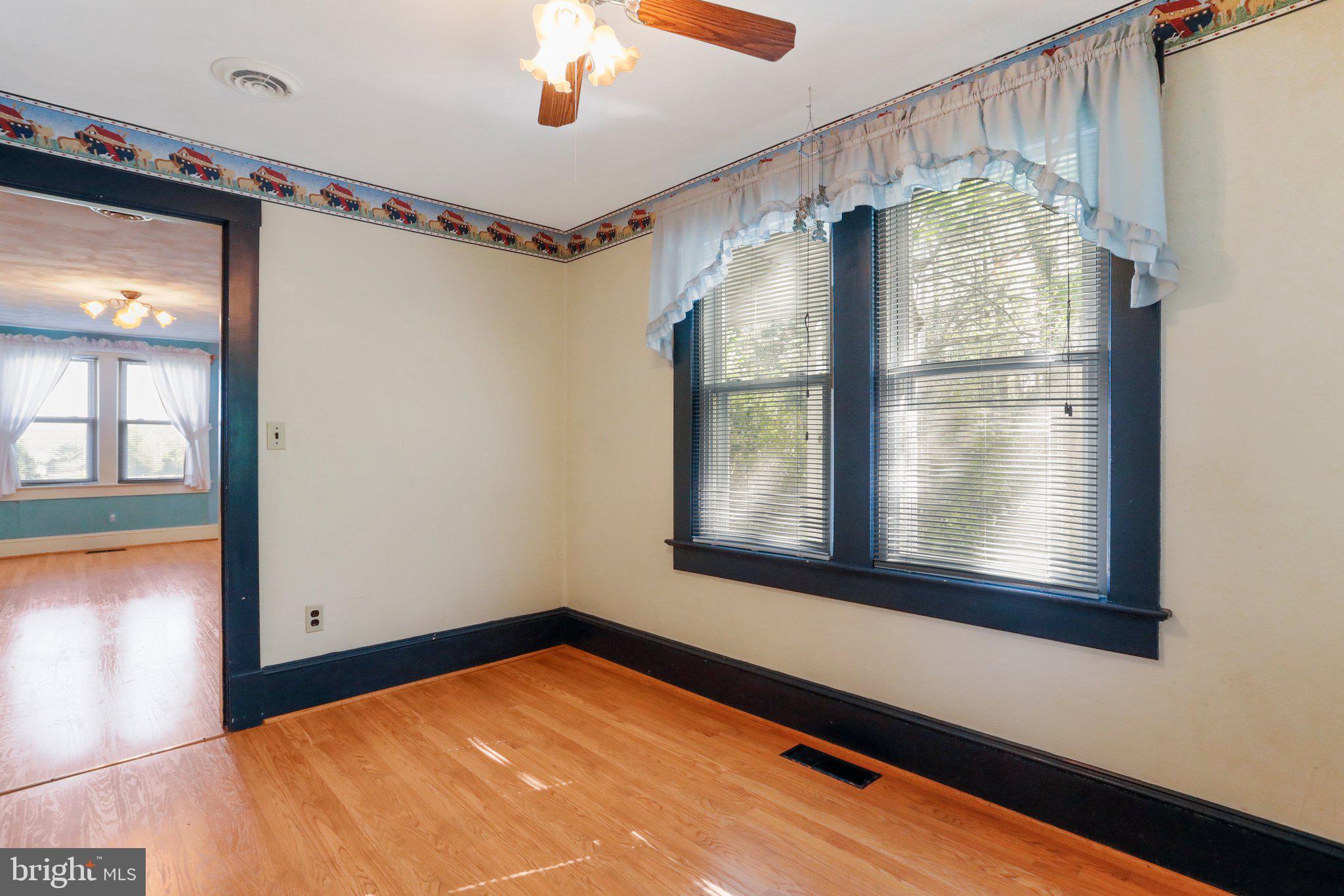 1477 Clearview Road Luray, VA 22835 - Photo 6 of 39 a view of a room with window and wooden floor