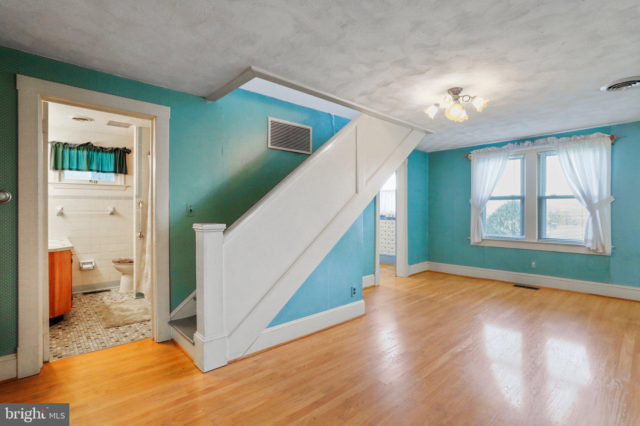 1477 Clearview Road Luray, VA 22835 - Photo 7 of 39 a view of livingroom with window and hardwood floor