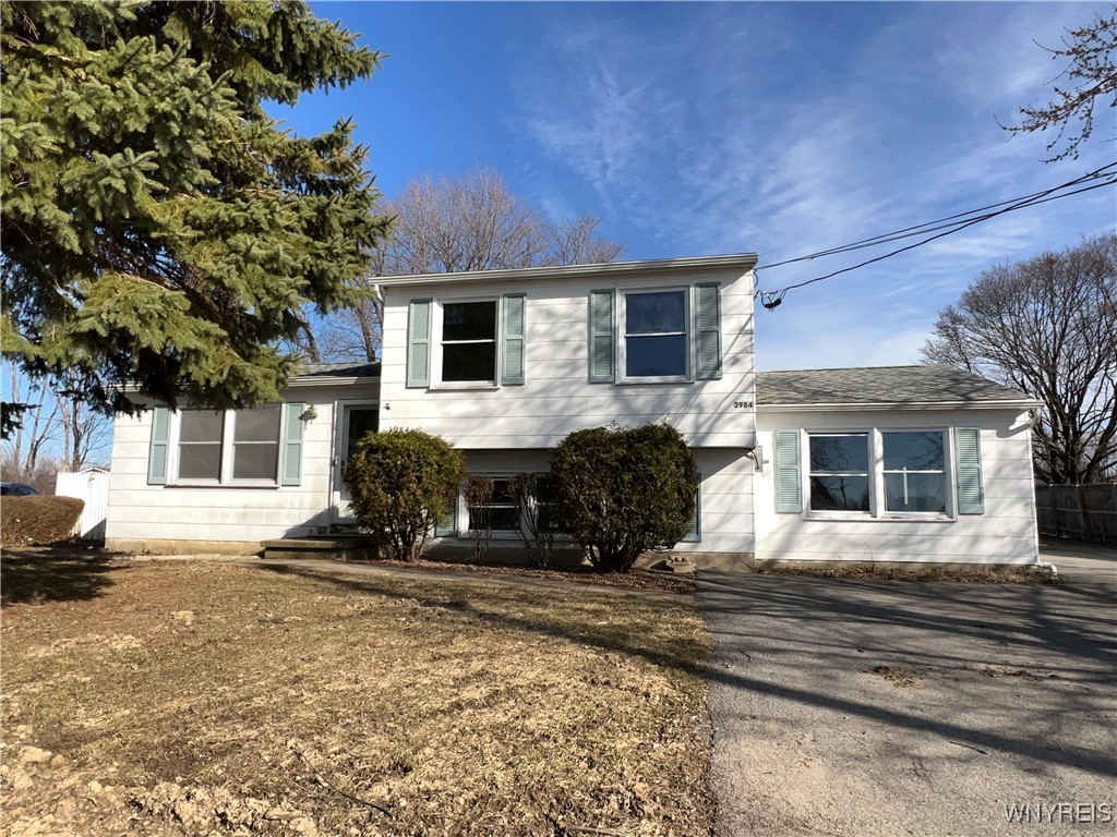 Split Level TWO FAMILY home.