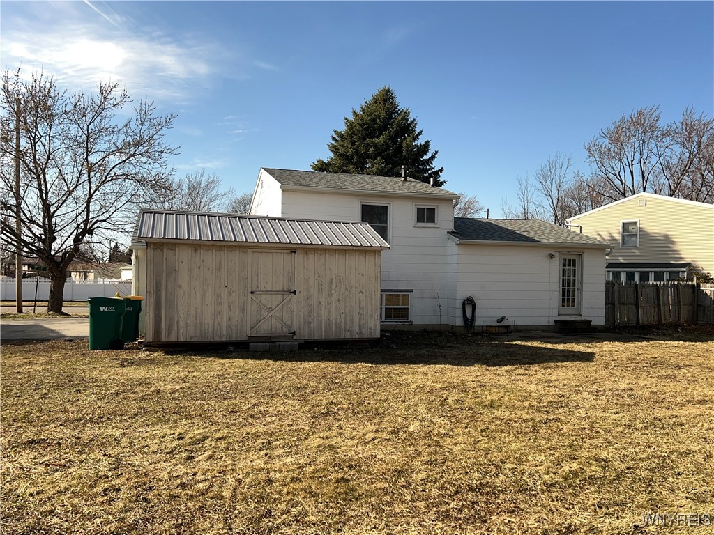 3984 Harvard Street Hamburg, NY 14075 - Photo 4 of 37 Large backyard is mostly fenced in except for the