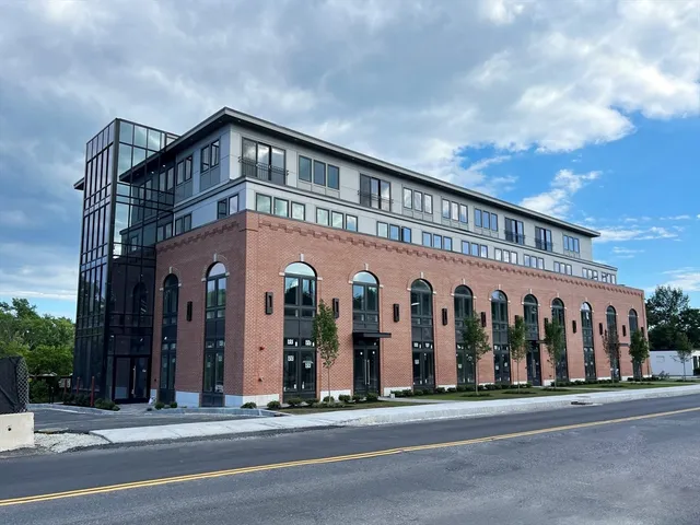 a view of a building with a street