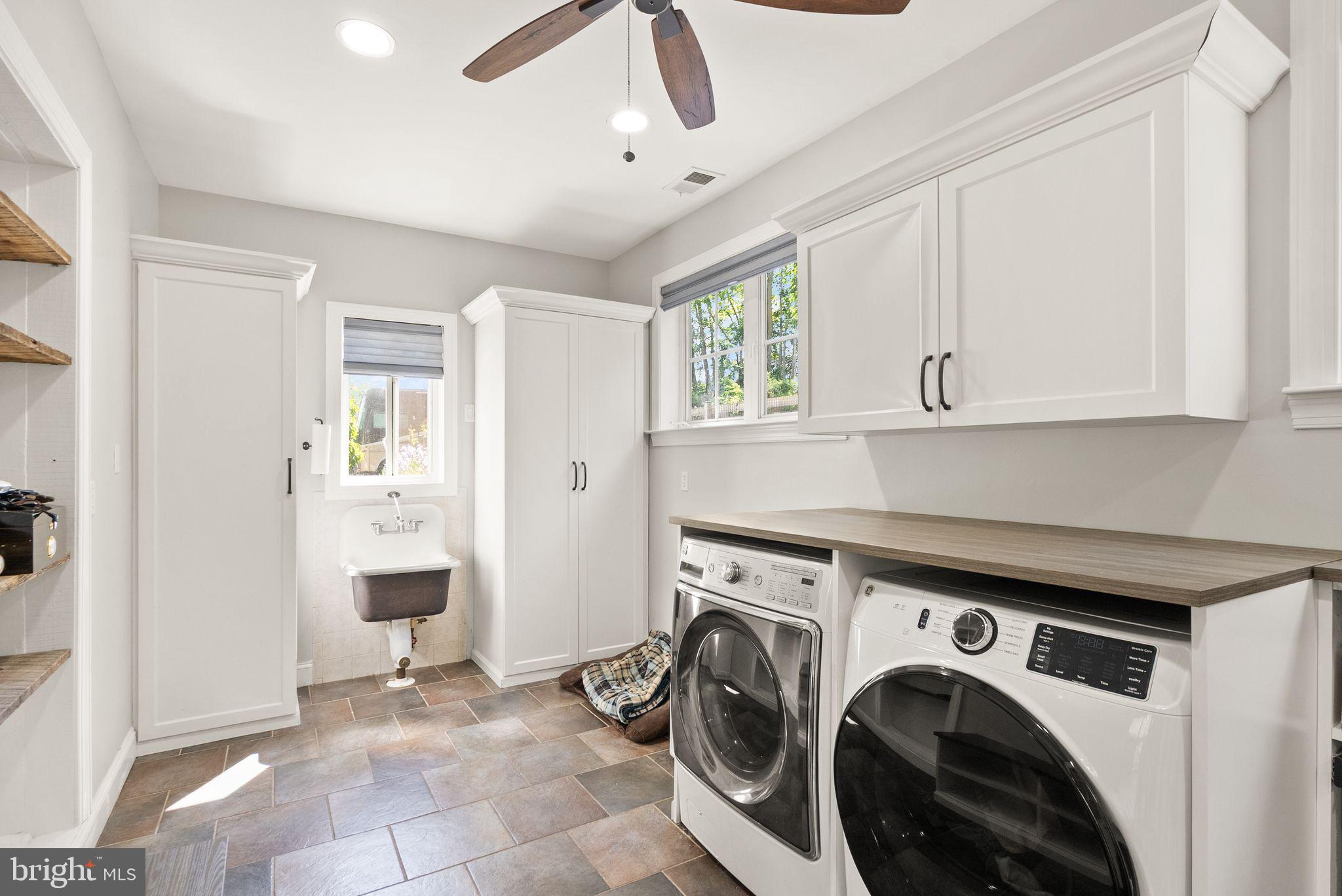 37151 Branchriver Road Purcellville, VA 20132 - Photo 28 of 63 a view of utility room with washer and dryer