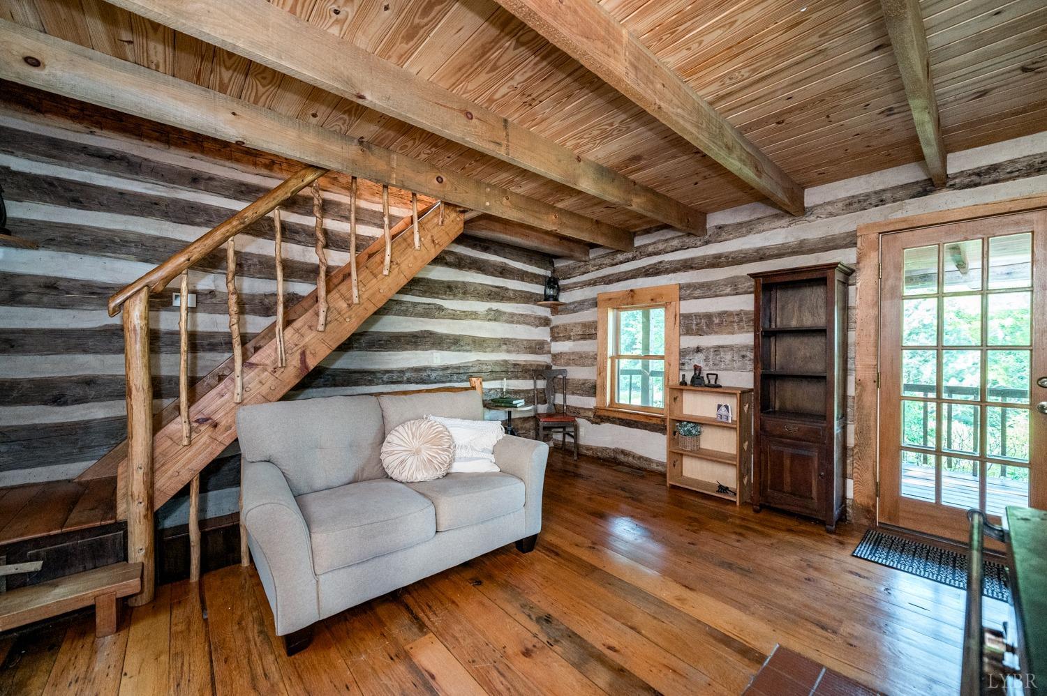 704 Peters Hollow Road Monroe, VA 24574 - Photo 11 of 55 a view of livingroom with furniture and staircase