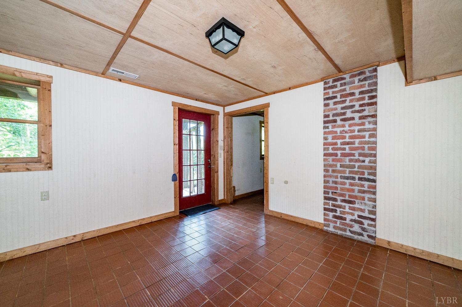 704 Peters Hollow Road Monroe, VA 24574 - Photo 27 of 55 a view of an empty room with a window