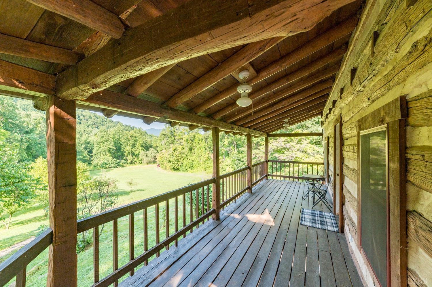 704 Peters Hollow Road Monroe, VA 24574 - Photo 5 of 55 a view of porch with wooden floor