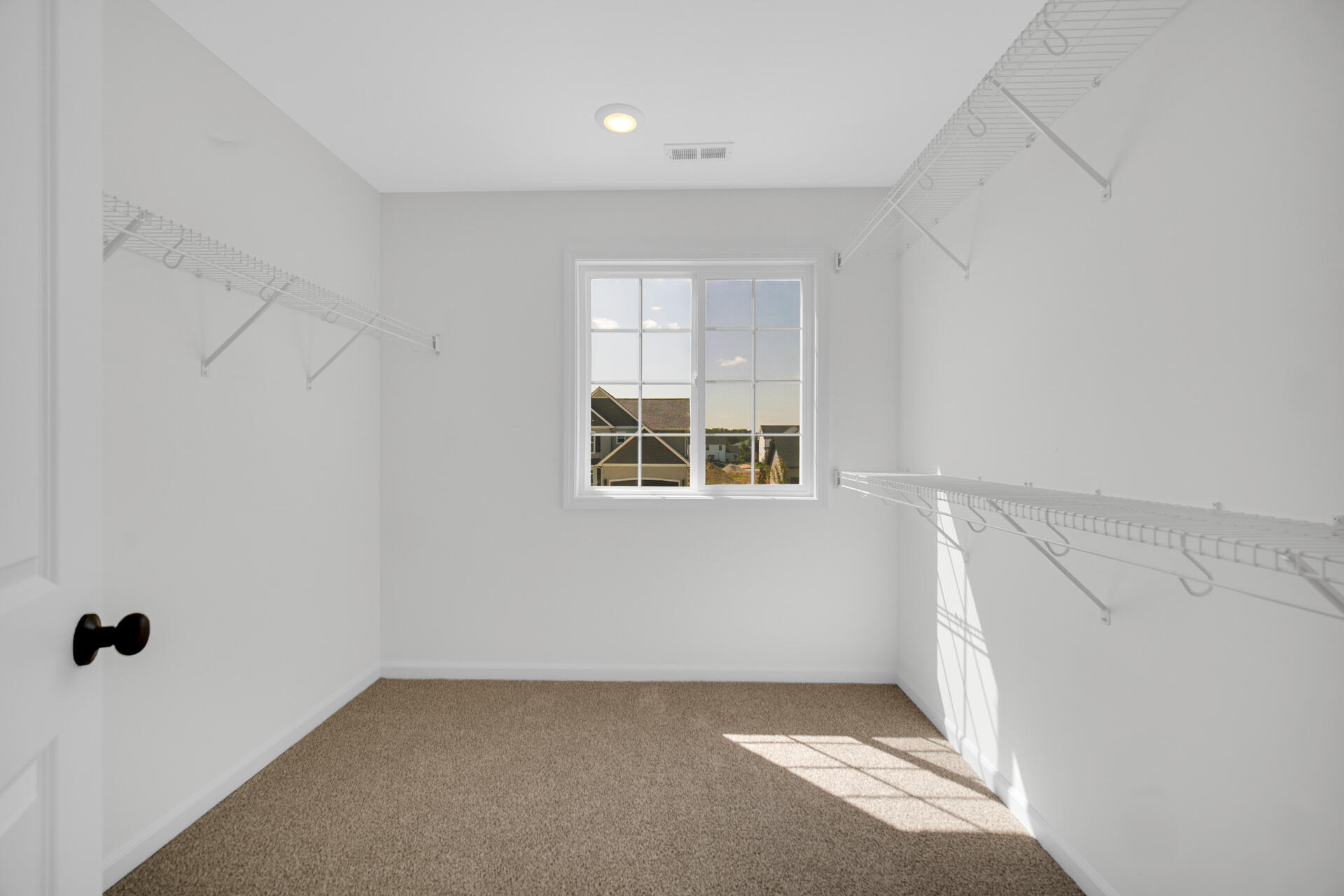 86 Bergamo Court Crown Point, IN 46307 - Photo 12 of 15 a view of an empty room with a window