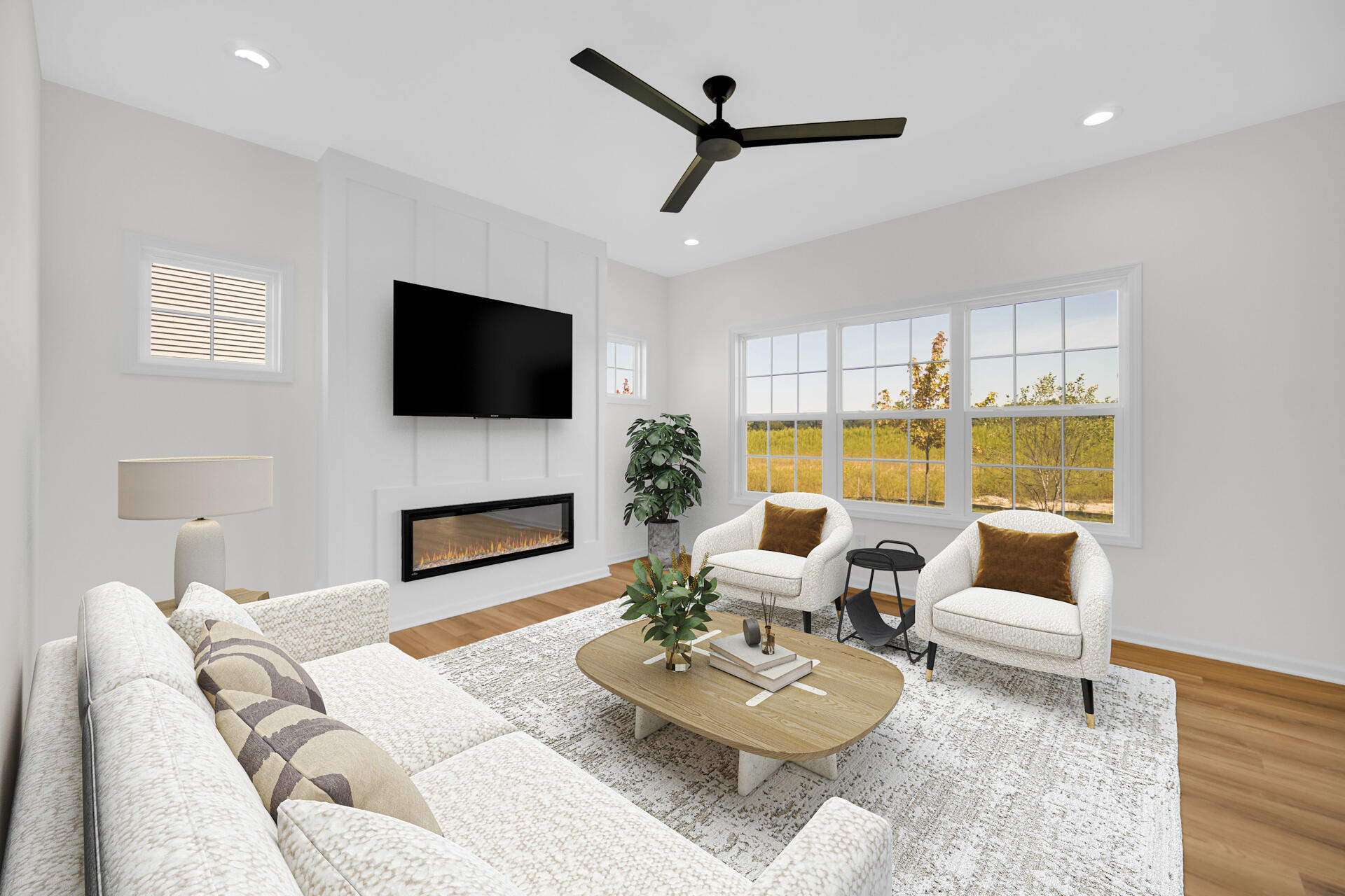 86 Bergamo Court Crown Point, IN 46307 - Photo 2 of 15 a living room with furniture a fireplace and a flat screen tv