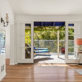 a view of front door with yard