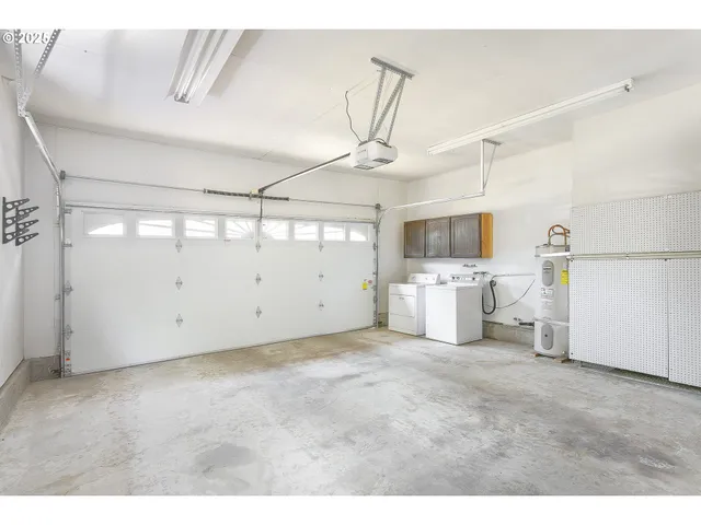 a view of a kitchen with a sink and dishwasher