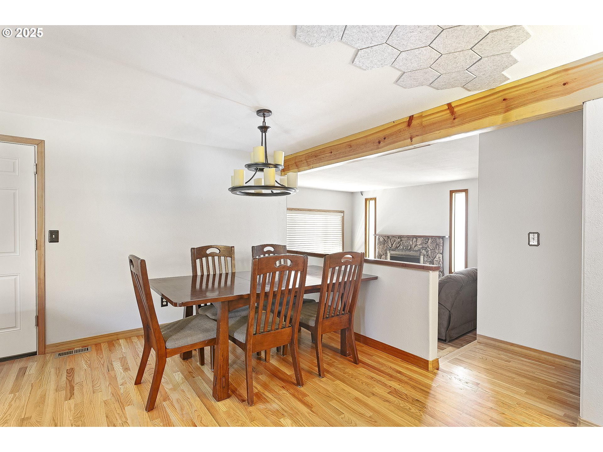 132 Southeast 214th Avenue Gresham, OR 97030 - Photo 7 of 27 a view of a dining room with furniture and wooden floor