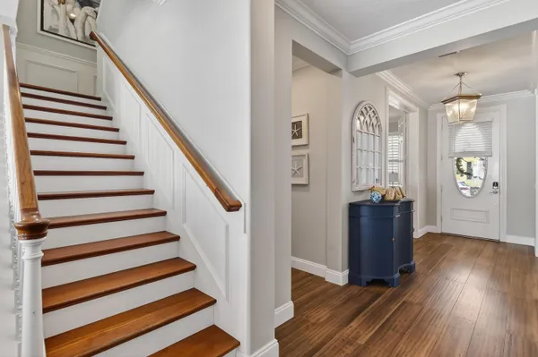 wooden floor in an empty room and a window