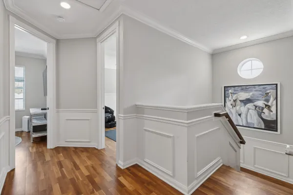 a bedroom with furniture fireplace and window