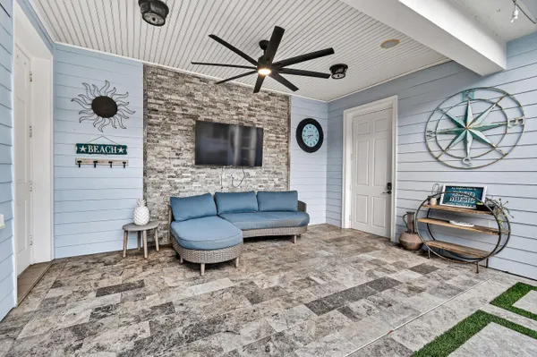 a view of swimming pool with lounge chair