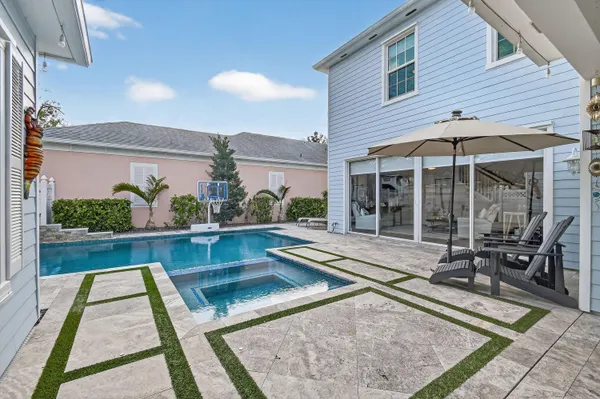 an aerial view of a house with a ocean view