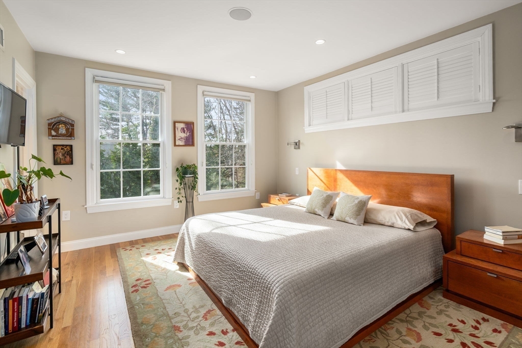 16 York Terrace Brookline, MA 02446 - Photo 18 of 42 a bedroom with bed and a large window