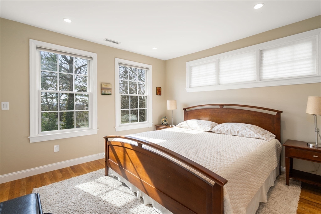 16 York Terrace Brookline, MA 02446 - Photo 29 of 42 a bedroom with a bed and a window with outer view