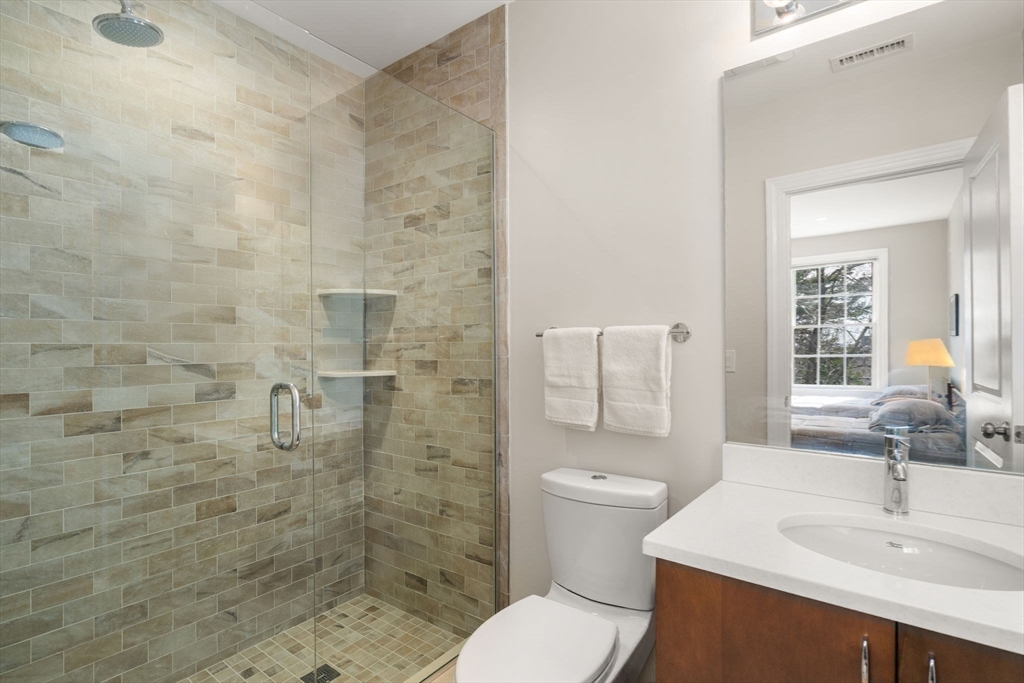 16 York Terrace Brookline, MA 02446 - Photo 34 of 42 a bathroom with a sink toilet and shower